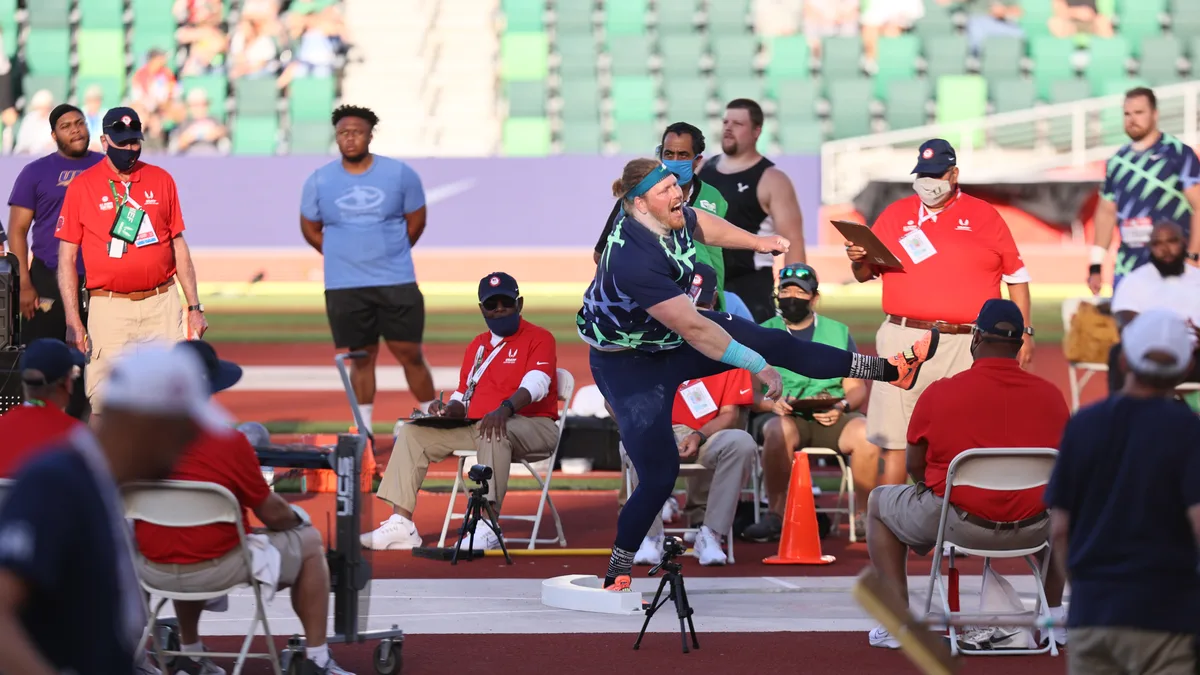 Shot put — rotational delivery in the circle.