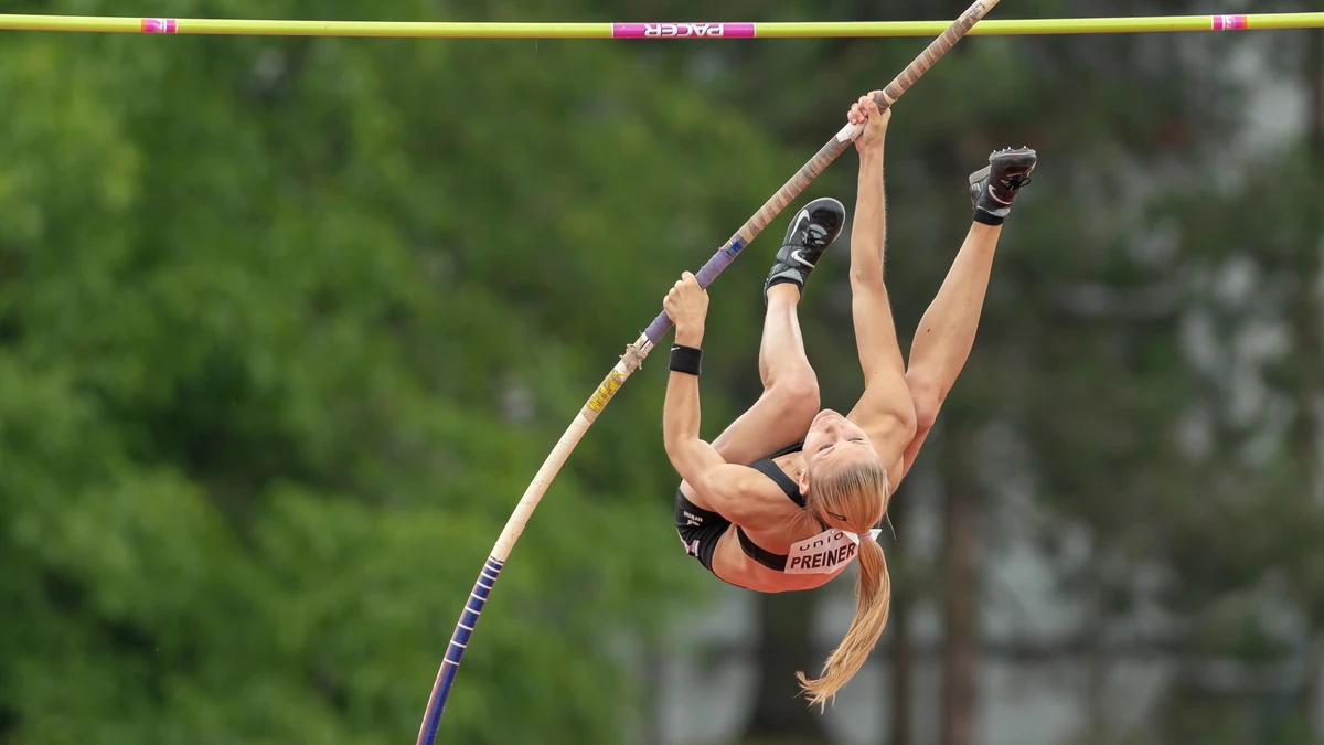 Pole-vault attempt — pole bend phase.